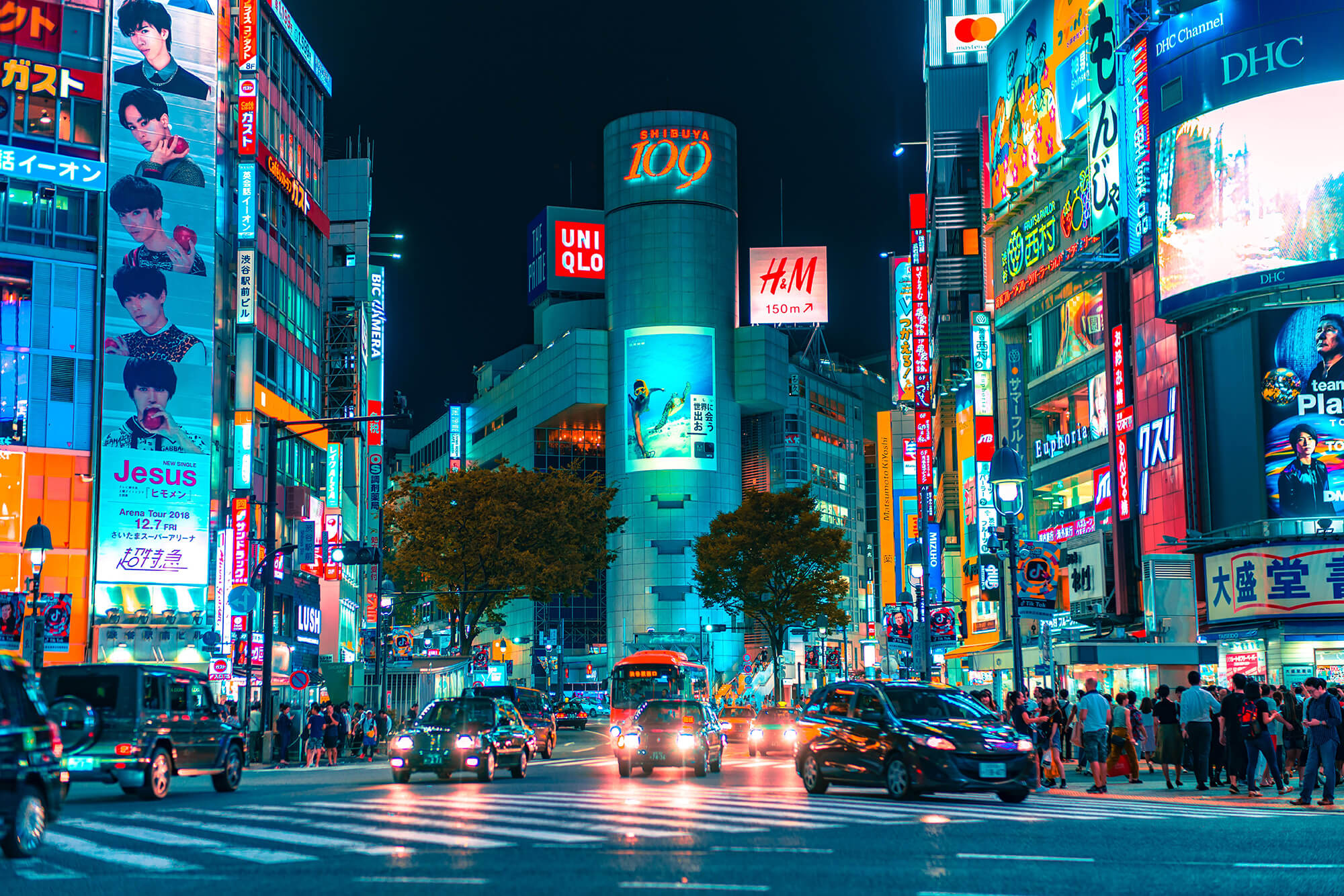 Busy city intersection with many billboards